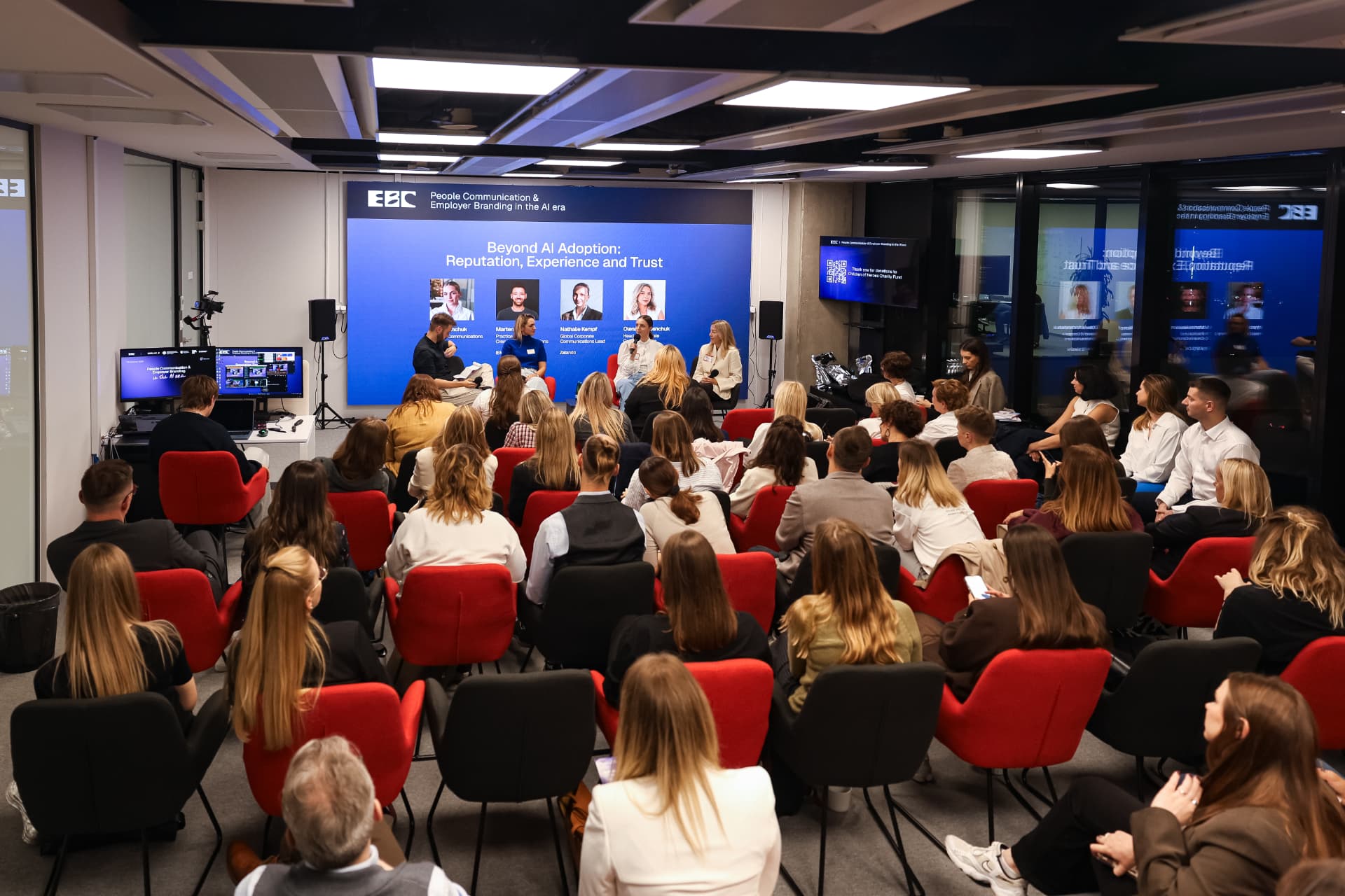 Wide view of the full room during the panel discussion